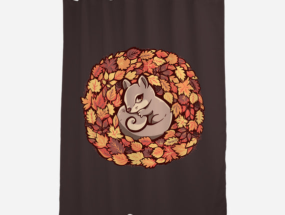 Squirrel Upon Autumn Leaves